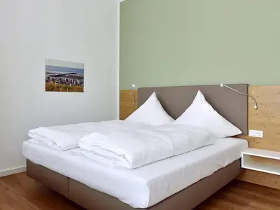 Schlafbereich mit Doppelbett