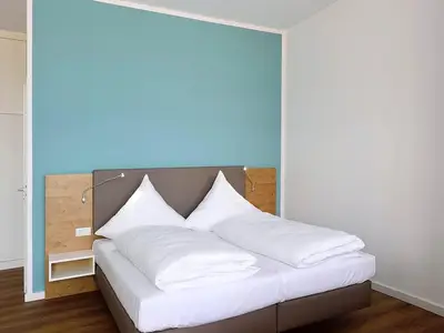 Schlafbereich mit Doppelbett