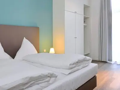 Schlafbereich mit Doppelbett