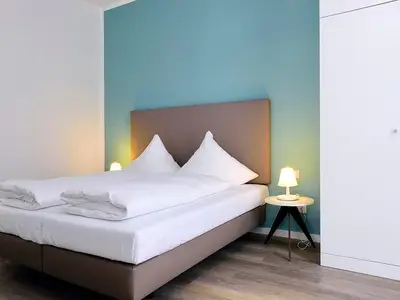 Schlafbereich mit Doppelbett