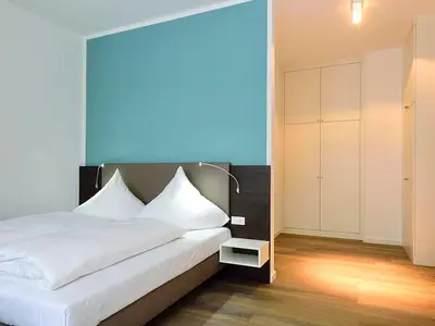 Schlafbereich mit Doppelbett