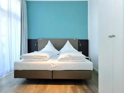 Schlafbereich mit Doppelbett