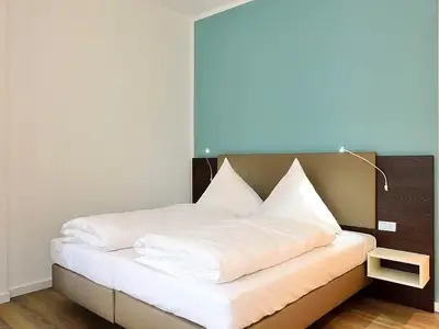 Schlafbereich mit Doppelbett