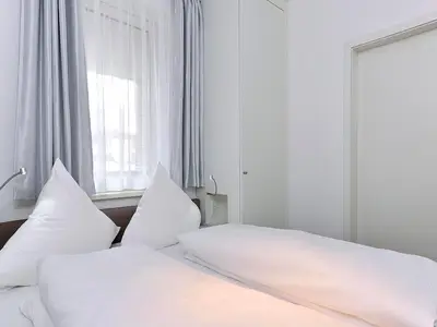 Schlafzimmer mit Doppelbett