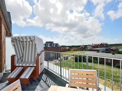 Balkon mit Sitzmöbel