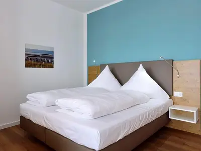 Schlafbereich mit Doppelbett