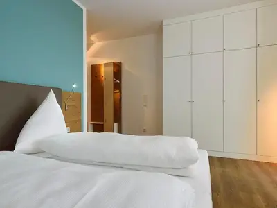 Schlafbereich mit Doppelbett