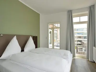 Schlafzimmer mit Doppelbett