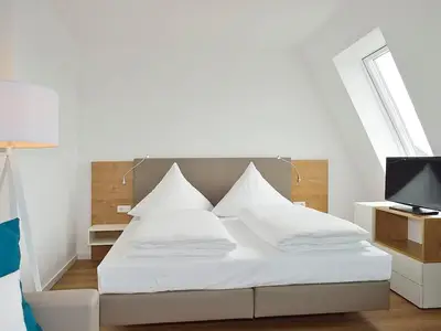 Schlafbereich mit Doppelbett