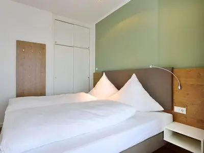 Schlafbereich mit Doppelbett