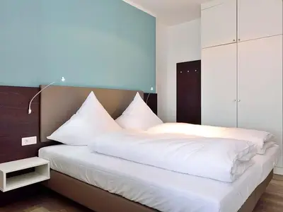 Schlafbereich mit Doppelbett