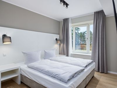 Schlafzimmer mit Doppelbett