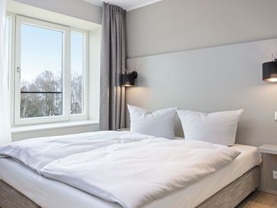 Schlafzimmer mit Doppelbett