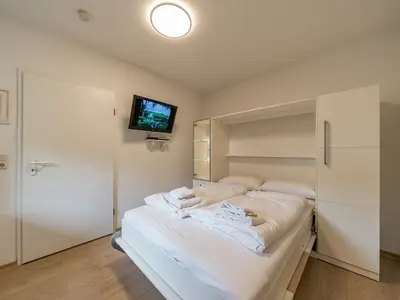 Schlafzimmer mit Doppelbett