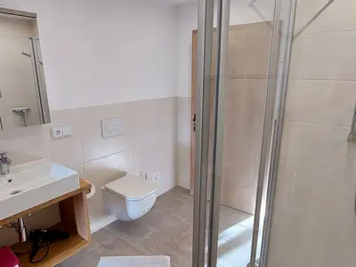 Badezimmer im Gästehaus Kaiserwinkl