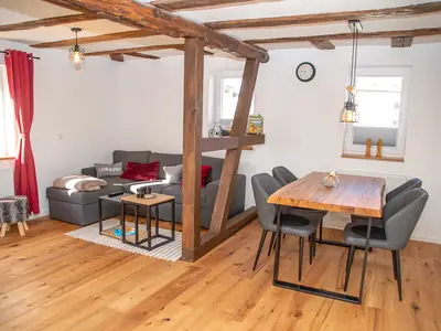 Wohnzimmer mit Echtholzparkett Eiche