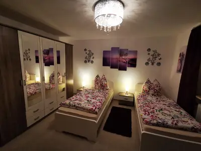 Schlafzimmer 1 auch mit getrennten Betten möglich