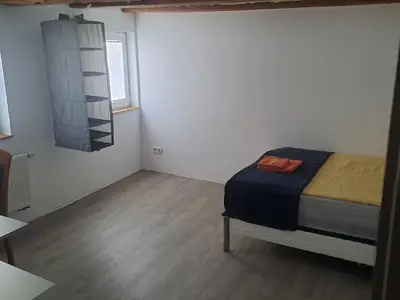 Schlafzimmer 2 im 1. OG