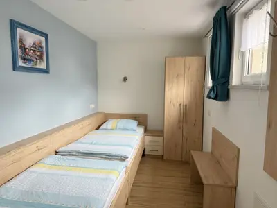 Schlafzimmer 2 mit 2 Einzelbetten