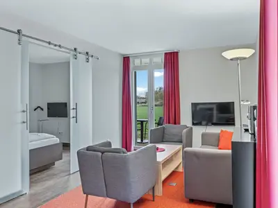 Wohnbereich mit Zugang zur Terrasse