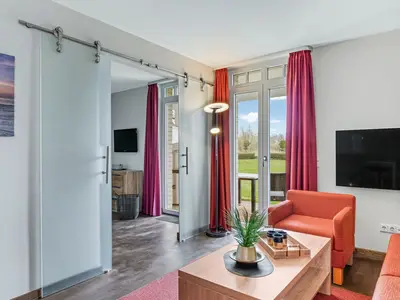 Wohnbereich mit Zugang zum Schlafzimmer