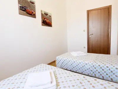 Schlafzimmer 2 mit zwei Einzelbetten