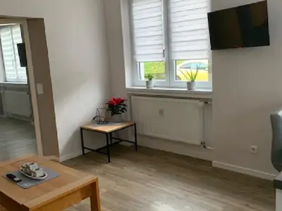 Wohnzimmer mit Fernseher Wohnzimmer mit Fernseher