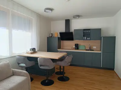 TOP 1 Küche  Eßplatz mit Sicht auf Piste