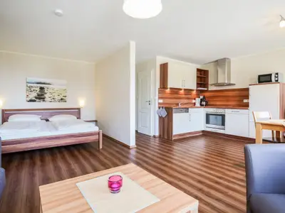 Schlaf-, Wohnbereich und Küche