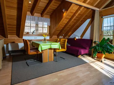 Esszimmer mit Schlafsofa