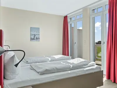 Schlafzimmer mit Doppelbett
