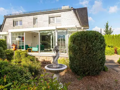 Ferienwohnung Lakeside House Waren (Müritz) - Blick vom Garten in den Wintergarten