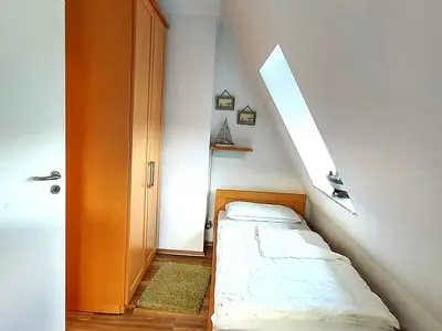 Schlafzimmer 2 mit zwei Einzelbetten