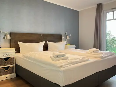 Schlafzimmer mit Doppelbett