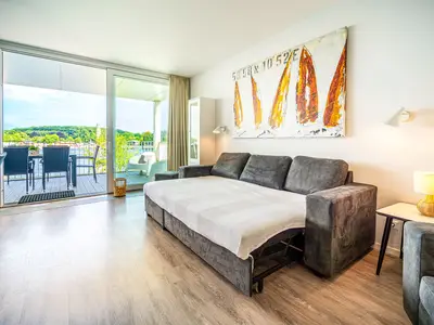 Wohnzimmer mit Schlafsofa