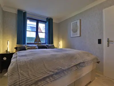 Schlafzimmer mit Doppelbett