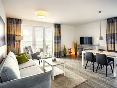 Wohn-Essbereich mit Couch und Flatscreen-TV