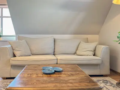 Wohnzimmer mit Schlafsofa