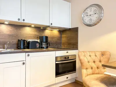 Küchenzeile im Wohnzimmer integriert