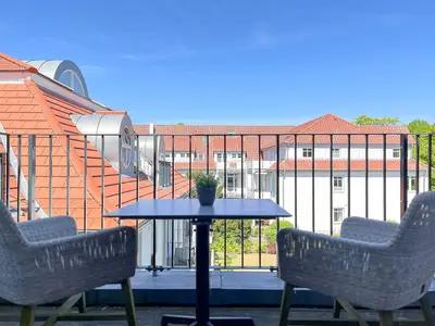 Balkon mit Sitzgelegenheit