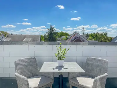 Balkon mit Sitzgelegenheit