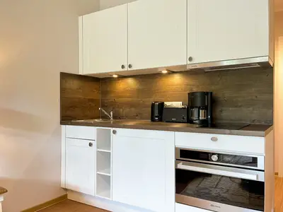 Küchenzeile im Wohnzimmer integriert