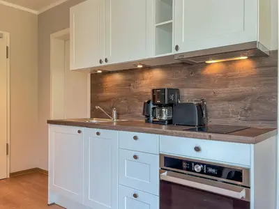 Küchenzeile im Wohnzimmer integriert