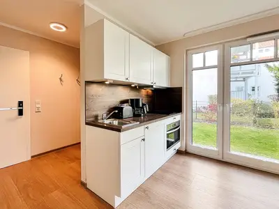 Küchenzeile im Wohnzimmer integriert