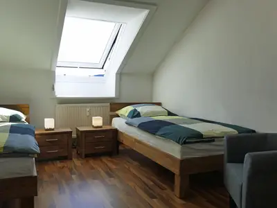 Schlafzimmer 2 mit Einzelbetten