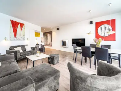 Wohnzimmer mit Ethanol Wandkamin und TV