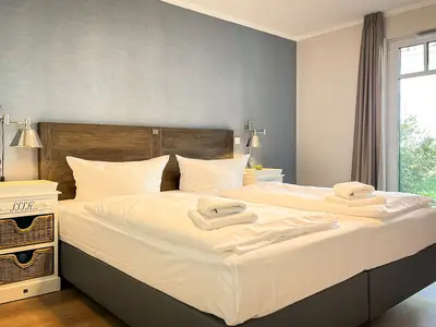 Schlafzimmer mit Doppelbett