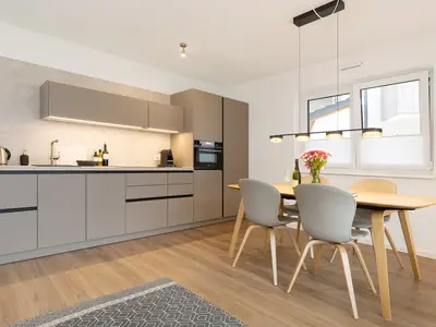 Wohnzimmer mit Küche