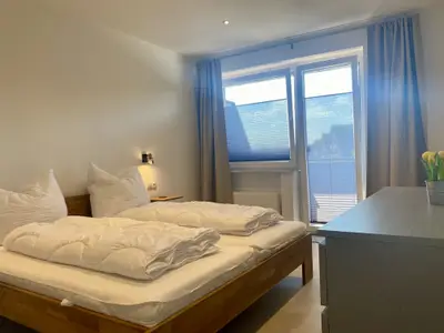 Schlafzimmer mit Doppelbett