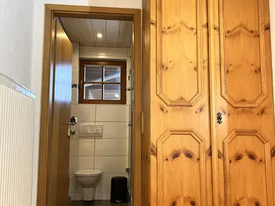 Zugang vom Schlafzimmer zum Bad